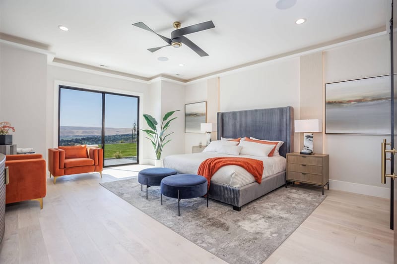 a photo of a spacious, luxury bedroom completed by custom home builders in Richland Prodigy Homes